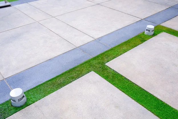 Custom concrete patio installed for a Frisco homeowner