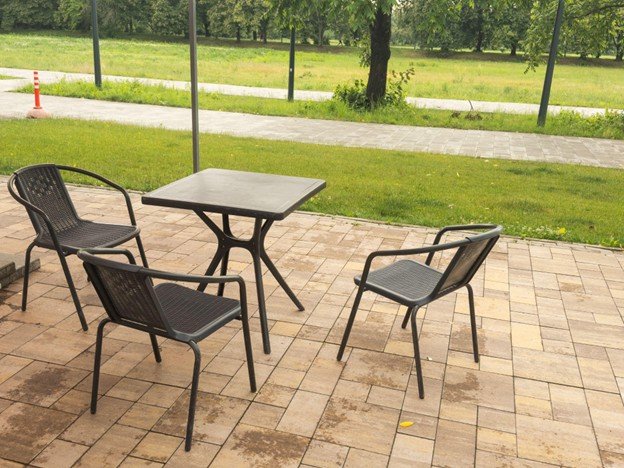 Newly installed stamped concrete patio with decorative pattern and clean finish